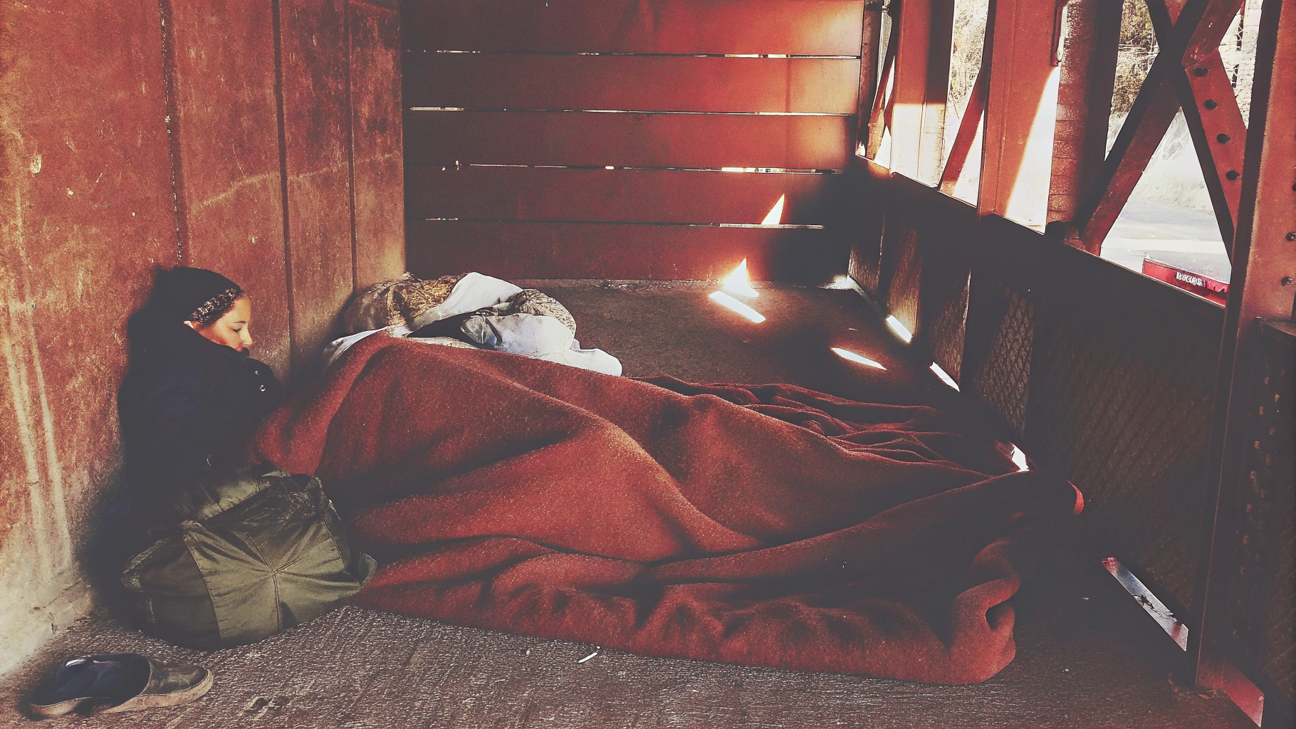 Person sleeping with blanket
