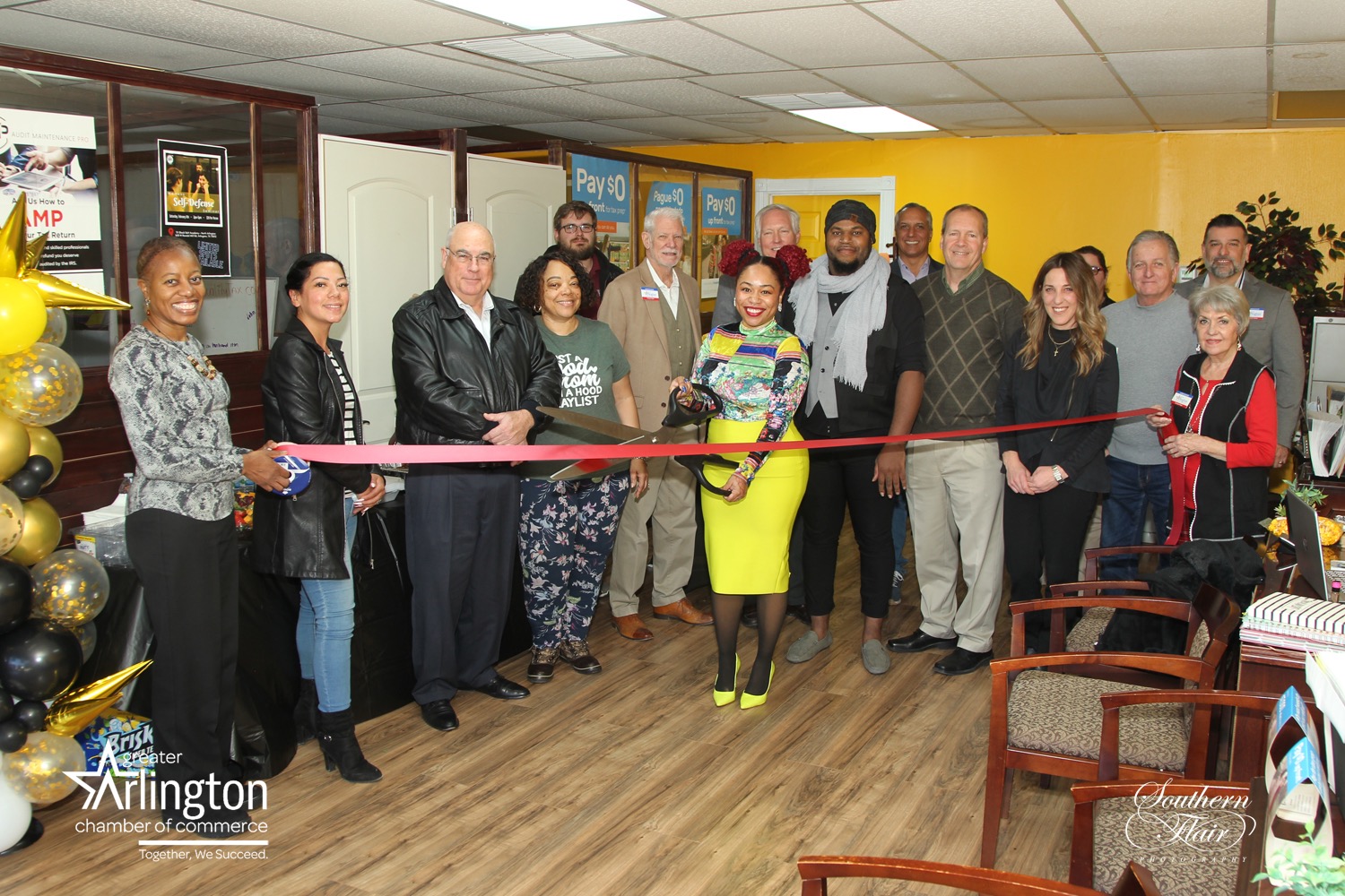Ribbon cutting ceremony with chamber members