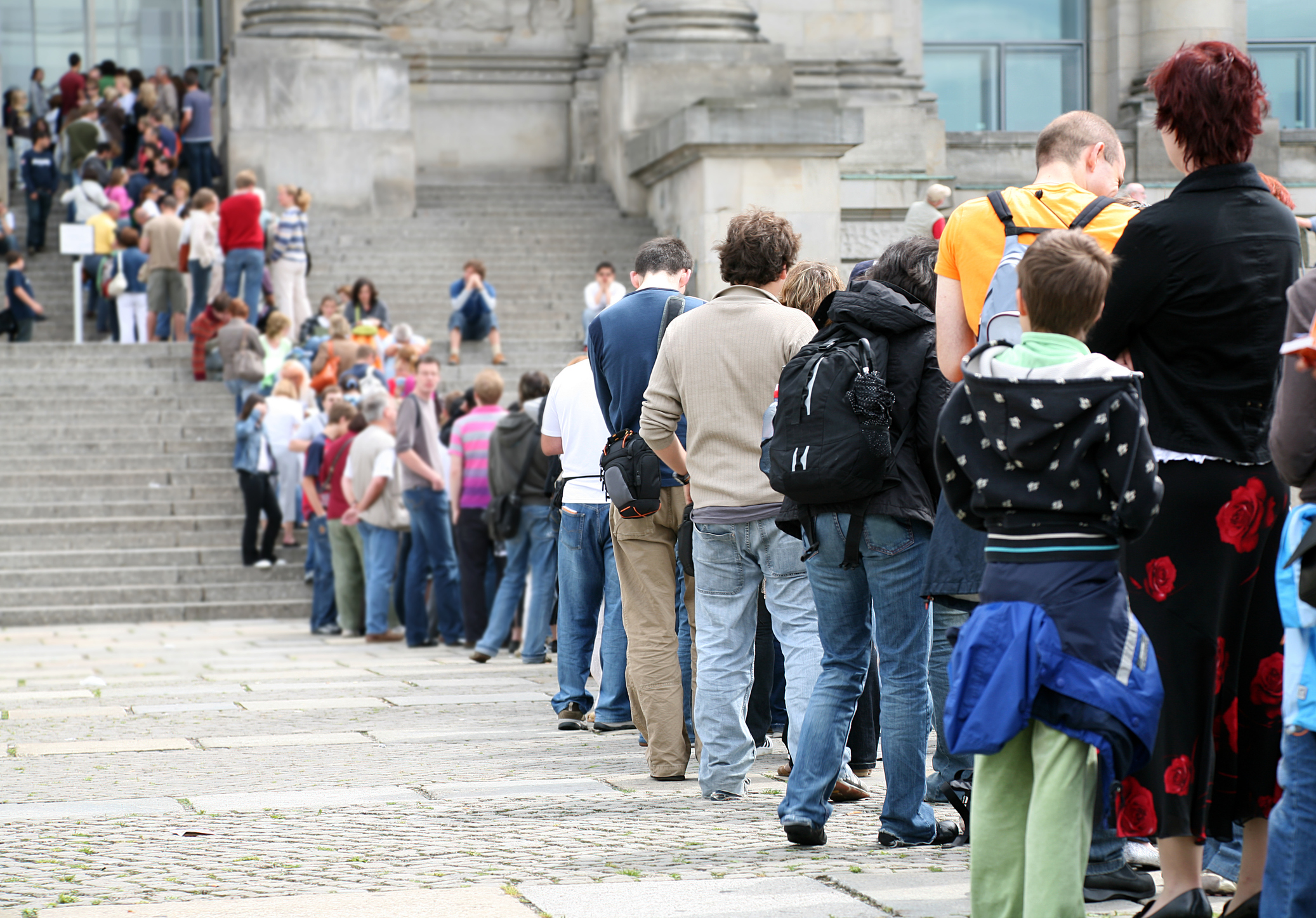 Crowds in busy public spaces