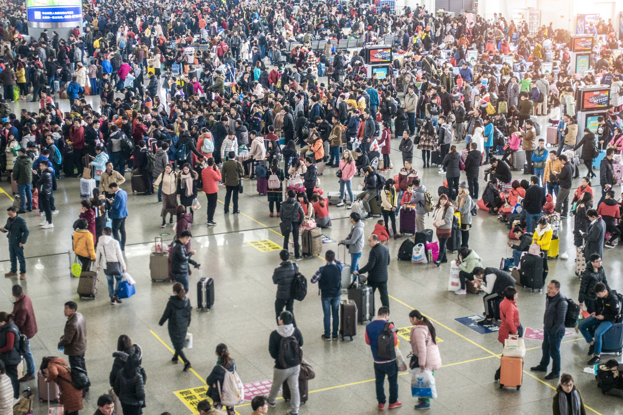 Crowds in busy public spaces