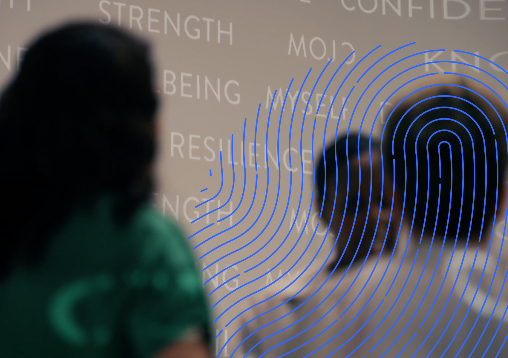 Women looking at wall of words
