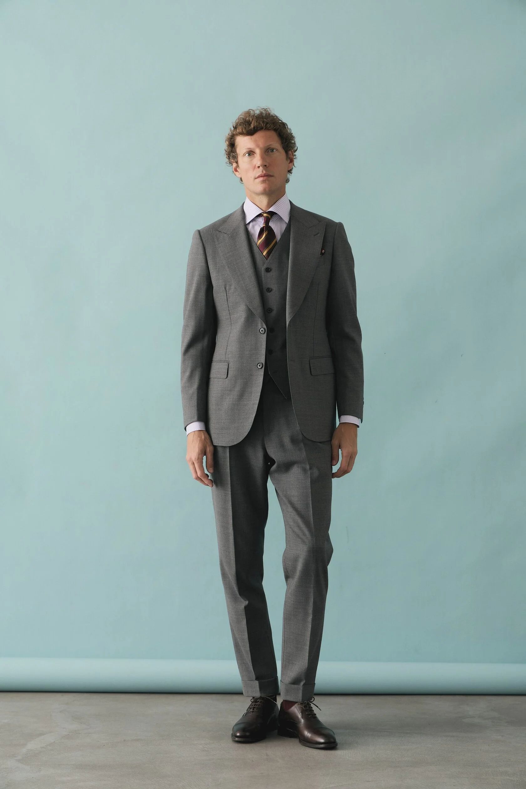 Light grey three-piece suit