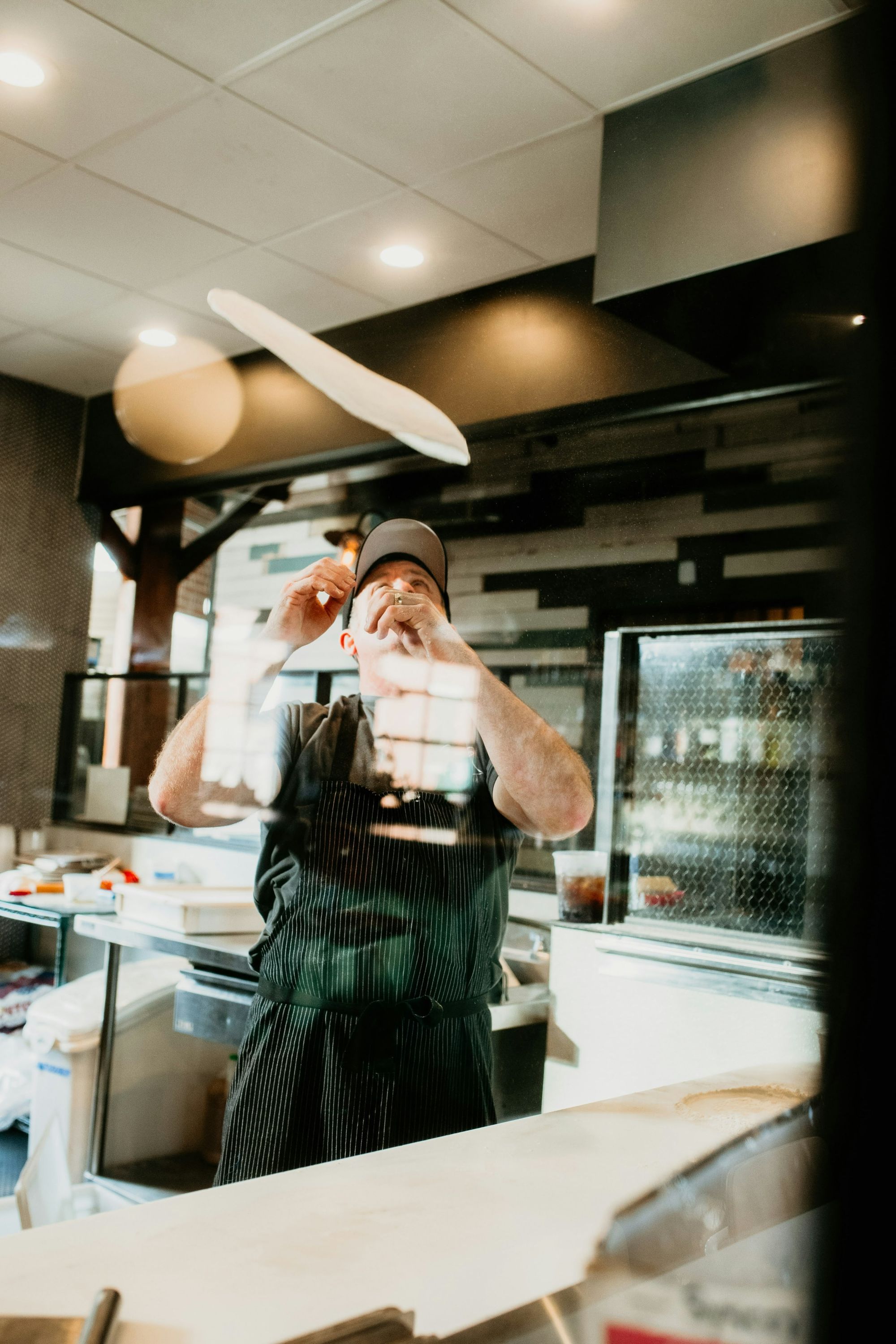 Restaurant kitchen staff preparing orders