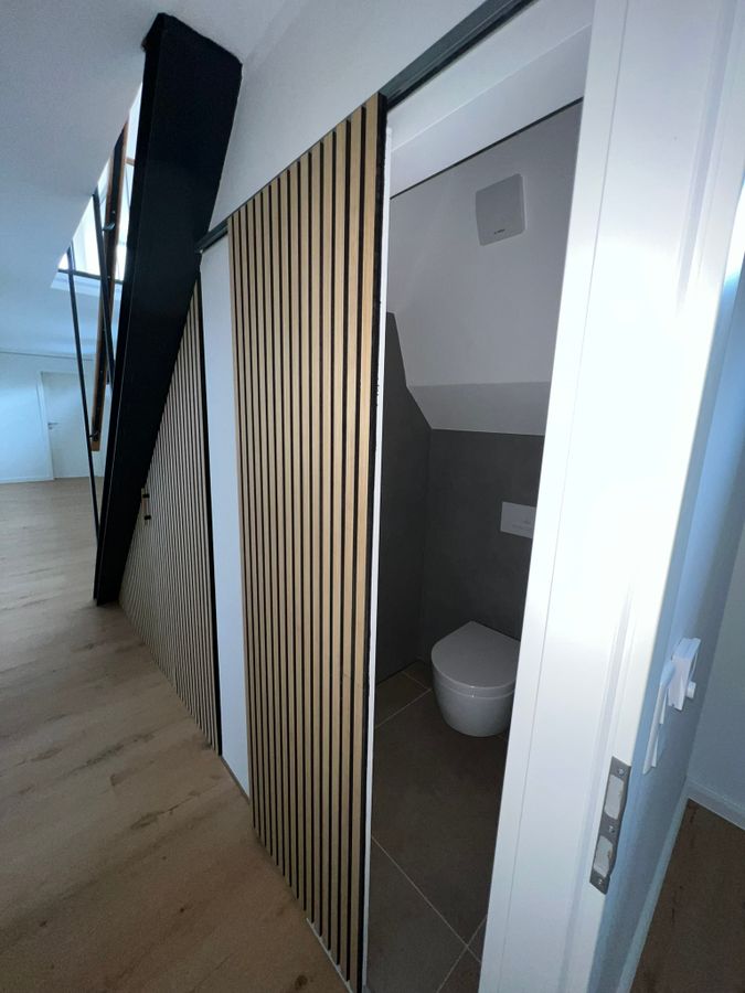 Finishing – Akustikpaneele & Gäste-WC im Obergeschoss